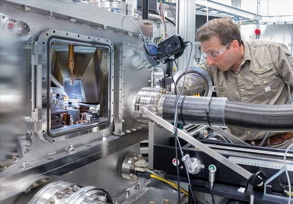 Lab image depicting lead battery research and partnerships for innovation.