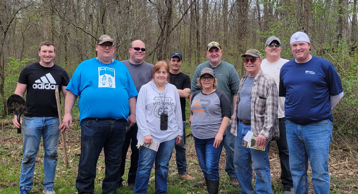 Element Resource employees plant trees for Earth Day
